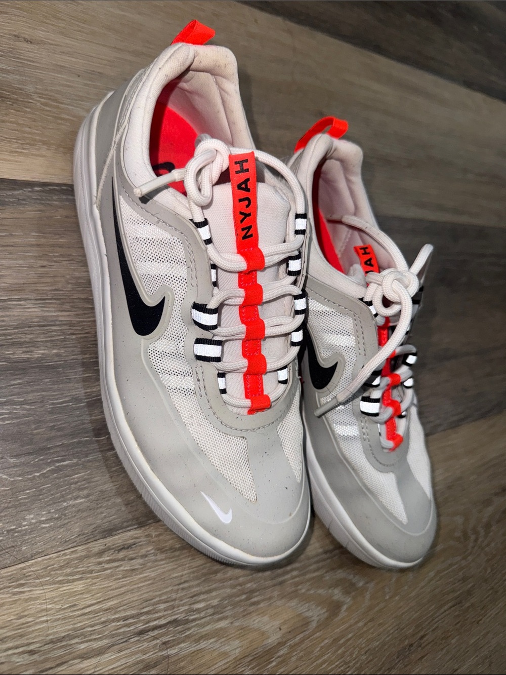 Nike White and Black Trainers with Neon Orange Accents